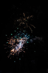 Fireworks in Blues, Oranges, Greens, and Gold