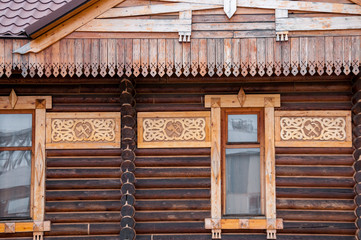 Wooden house carved parts of the building