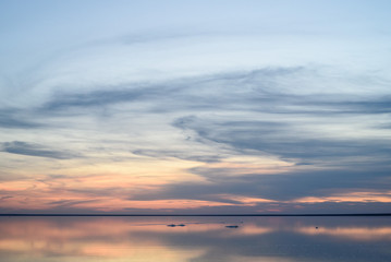 Salt lake. Evening sunset with beautiful sky and water.