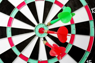 Target and darts arrows hitting the target