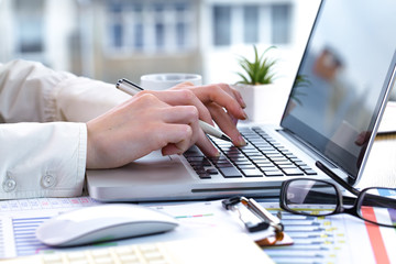 female hand with objects for doing business in the office
