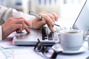 female hand with objects for doing business in the office