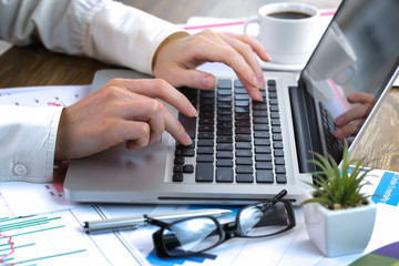 female hand with objects for doing business in the office