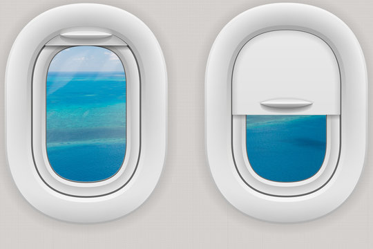 Fenster im Flugzeug mit Blick auf das Great Barrier Reef