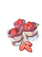 homemade strawberry tiramissu with fresh strawberries  in glass and  isolated on white background