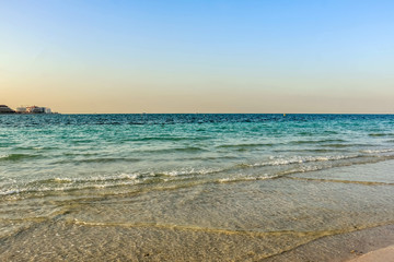 Horizon of Seascape, water waves at Jumeirah Beach in Dubai, United Arab Emirates