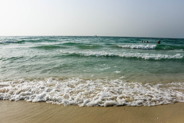 Horizon of Seascape, water waves at Jumeirah Beach in Dubai, United Arab Emirates