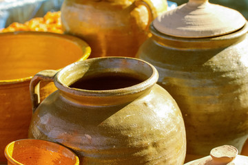 clay jugs and pots handmade close-up. background with pottery.