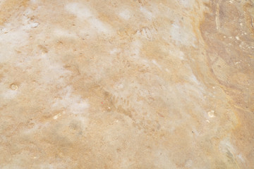 Close up rugged texture detailed of natural yellow rock sandstone background.