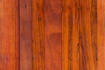 Thick vertical wood planks deck texture wallpaper background in red brown color