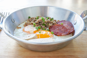 Indochina pan-fried egg with toppings, Thai Breakfast.