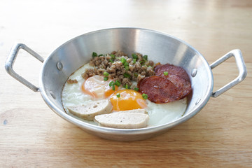 Indochina pan-fried egg with toppings, Thai Breakfast.
