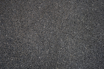 Small varies shape of black gravel stone texture wall floor for wallpaper, background or decoration printables.