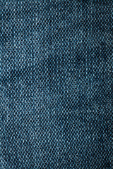 Fototapeta na wymiar Blue denim texture, background, abstraction. Textile space for text.