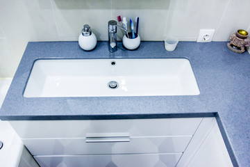 Modern house interior white bathroom decor elements and luxury furnishing segments of an empty apartment with washing machine