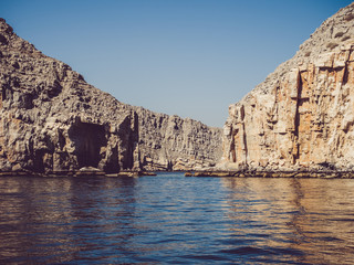 Fototapeta na wymiar Khasab. Oman Fjords. View from the boat. Concept of leisure and travel