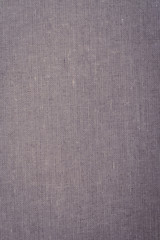 Naklejka na ściany i meble Gray-lilac fabric texture, background, abstraction. Space for text. Matte coating