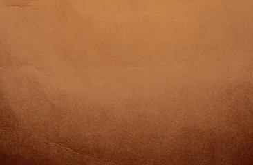 Brown cardboard texture, background, abstraction, gradient. Paper space for text.