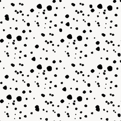 vector illustration of seamless black and white irrregular dots pattern