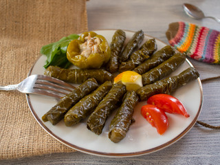traditional Turkish dishes with olive oil leaves and stuffed peppers
