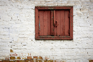 brick wall fragment with old dirty door or window