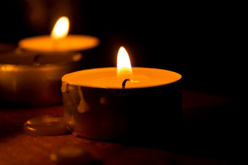 burning candles in the dark