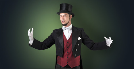 Handsome magician with no graph holds something invisible