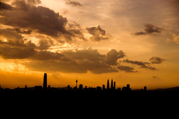 Fototapeta premium Sunset view of kuala lumpur city from bukit ampang, kuala lumpur, Malaysia. Taken from Ampang Lookout Point.