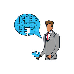 businessman with puzzle pieces in shape speech bubble