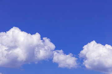 Blue sky and white clouds, rain clouds on sunny summer or spring day.