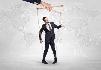 Puppet man with big city great power concept
