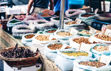 spices and nuts in the fruit market, Catania, Sicily, Italy.