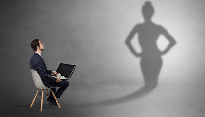 Rich businessman staying and offering stuffs to a pretty shadow woman
