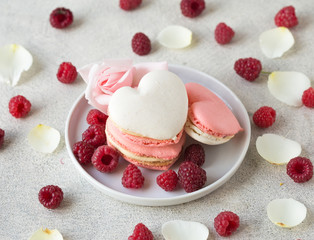 A beautiful heart made of macaroons and raspberry. Valentines day consept. flat lay, top view. 