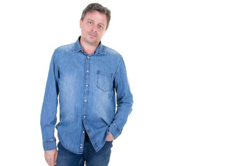 Portrait of confident mature man standing on white background