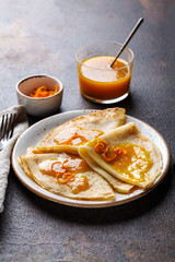 Traditional French crepe Suzette with orange sauce.