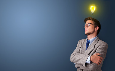 Young person looking for new idea with lighting bulb concept
