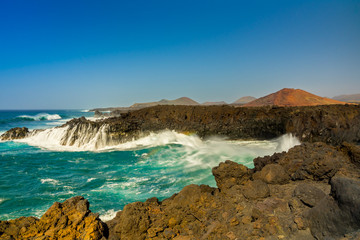 Spain, Lanzarote, Rough waves of atlantic ocean in los hervideros bay