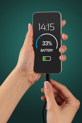 Elegant hand charging cellphone with low battery
