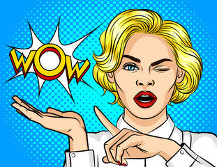 Color vector illustration pop art girl winks and point the finger to the side. Wow effect. The girl is surprised. Shocked girl points to the bubble with the word wow. Promotional poster for discounts