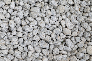 Gray stone pebble ground background