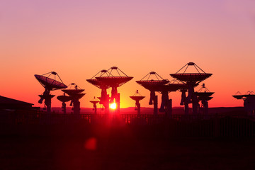 Observatory equipment, silhouette at sunrise