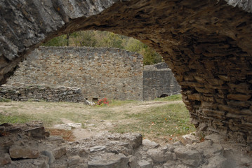 An old medieval fortress. Stone wall and elements of the fortress.