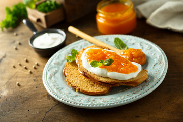 Toasts with cream cheese and citrus jam