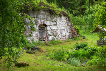 SOLOVKI, REPUBLIC OF KARELIA, RUSSIA - JUNE 27, 2018:  Old cellar in the Botanical garden on Solovki. Solovki Islands, Arkhangelsk region, White Sea © Konstantin