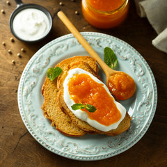 Toasts with cream cheese and citrus jam