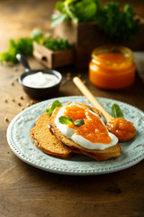 Toasts with cream cheese and citrus jam