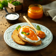 Toasts with cream cheese and citrus jam