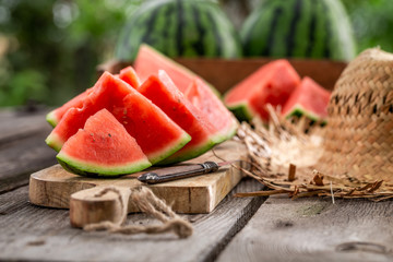 Sweet and tasty watermelon in summer garden
