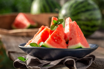 Sweet and tasty watermelon in sunny day - obrazy, fototapety, plakaty